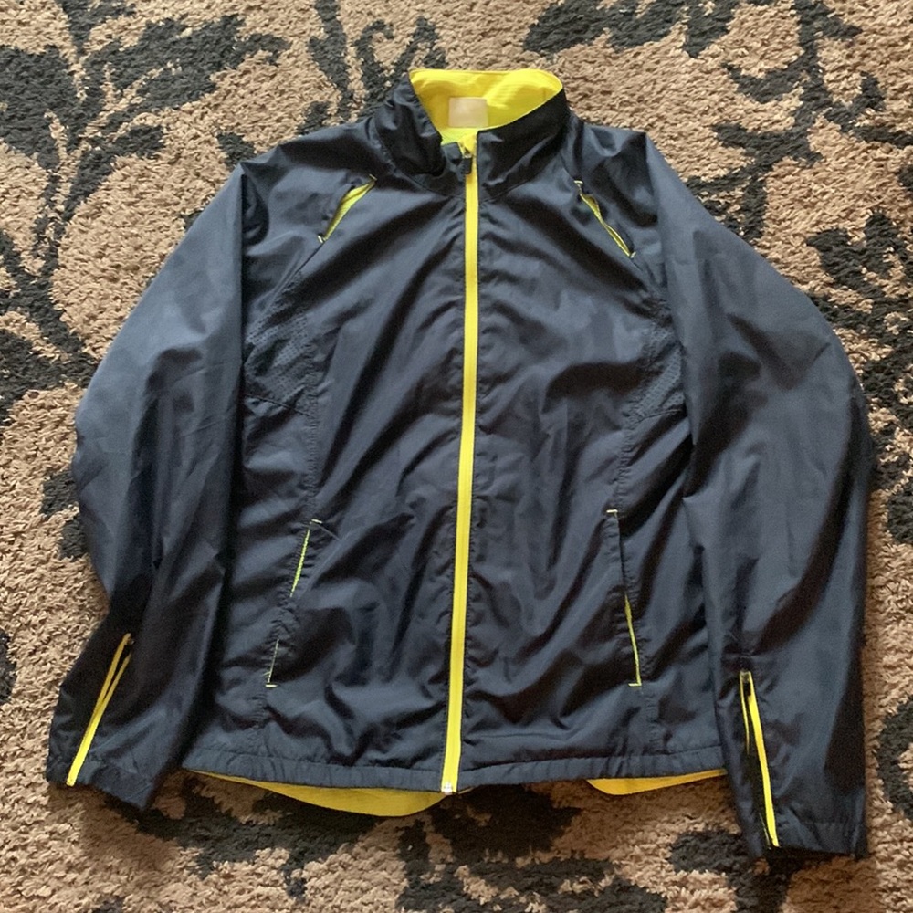 Navy blue and yellow running jacket. Rain jacket material.